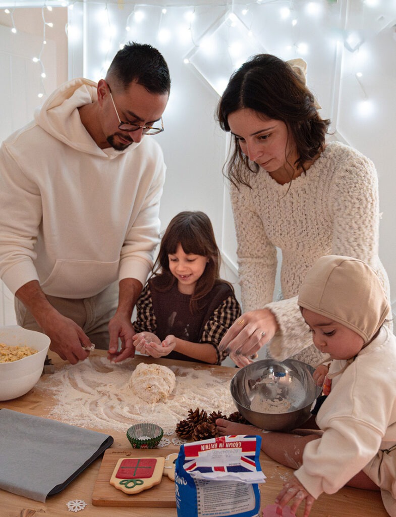 christmas family in home photoshoot baking
